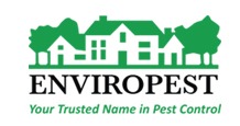 Logo for ENVIROPEST featuring a silhouette of a house with trees in green above the company name in bold black text. Below, green text reads "Your Trusted Name in Pest Control.