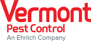 Logo with the words "Vermont Pest Control" in bold red letters, and below in smaller gray text, it says "An Ehrlich Company.