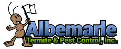 Cartoon ant holding a white flag stands next to the blue and black text "Albemarle," with green text below reading "Termite & Pest Control, Inc." on a white background.