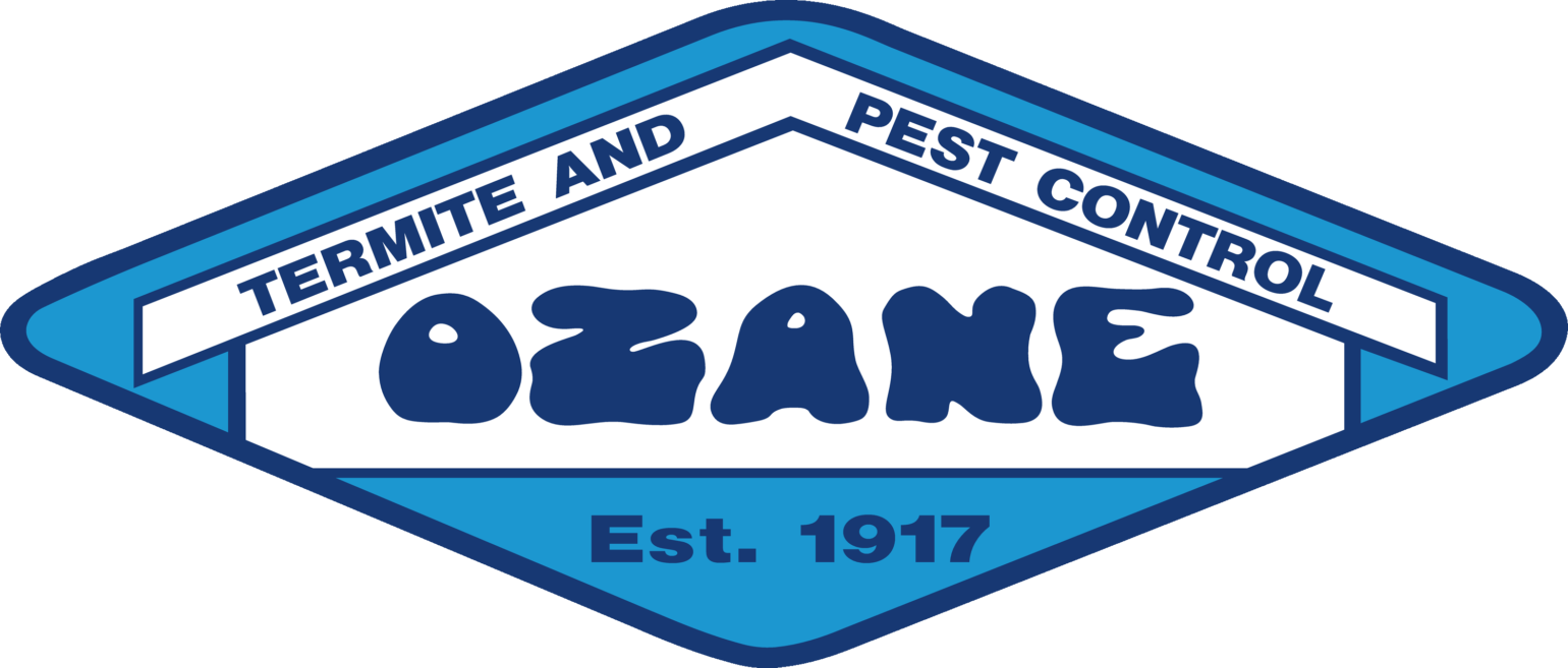 Logo for Ozane Termite and Pest Control. The text "TERMITE AND PEST CONTROL" is at the top, "OZANE" is in large, wavy letters in the center, and "Est. 1917" is at the bottom. The design uses blue and white colors.